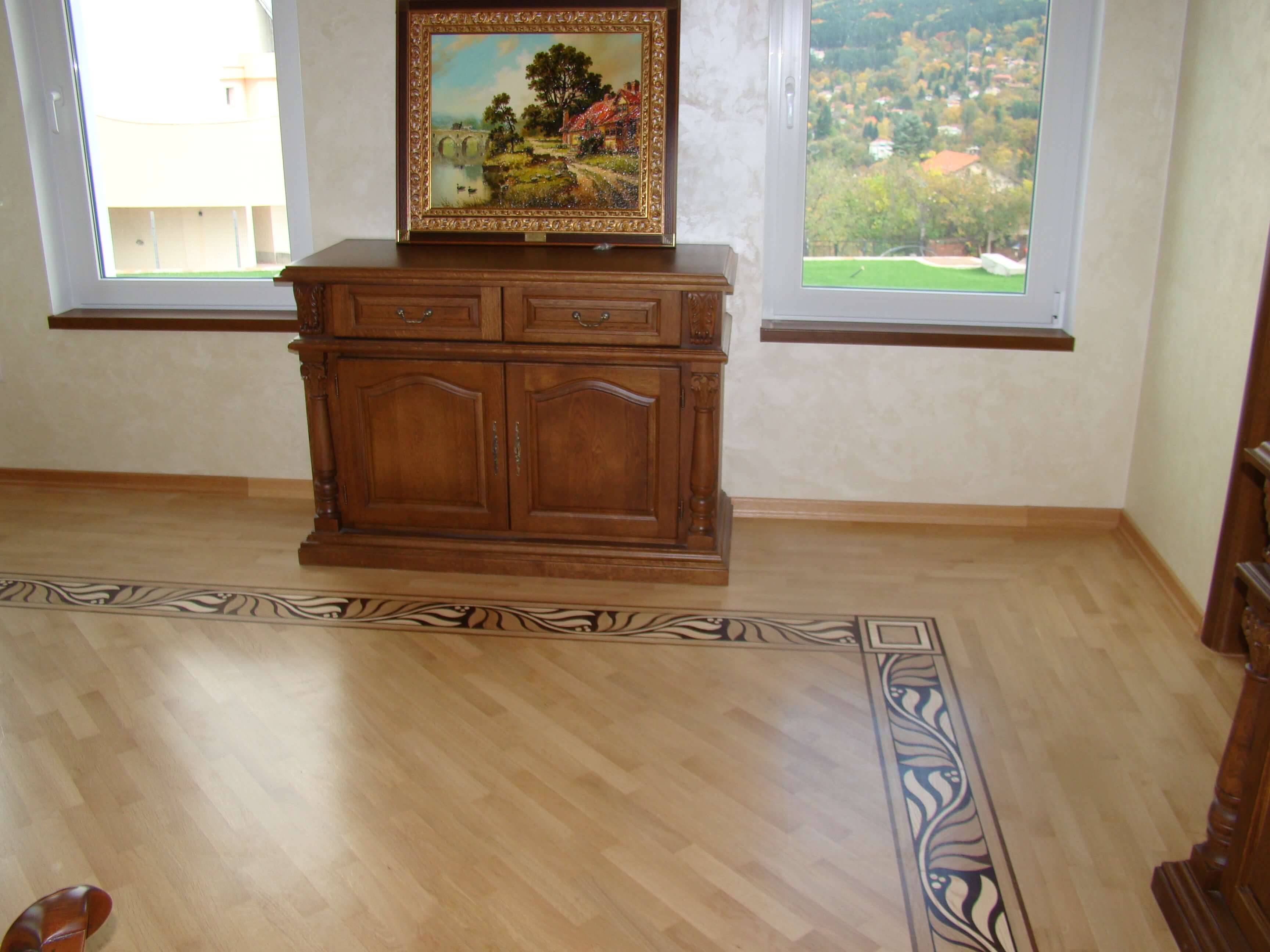 Combination of ash, wenge and oak parquet flooring.